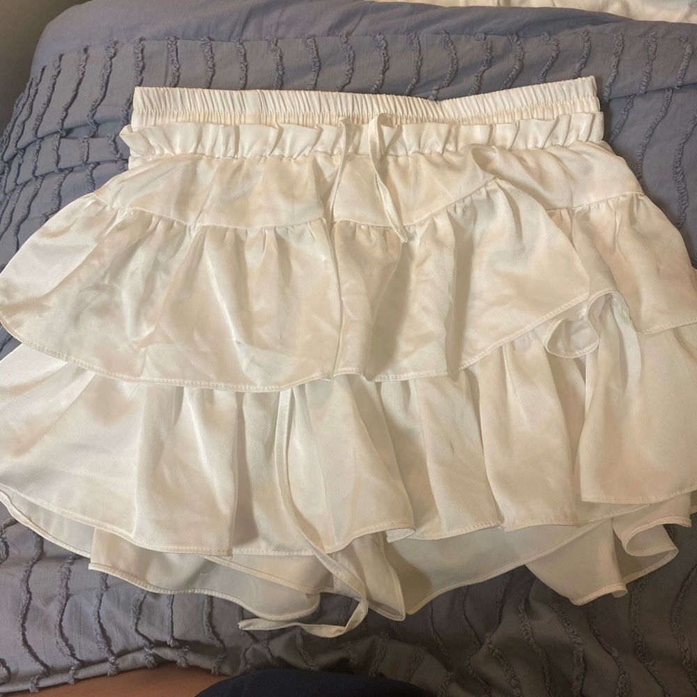 White ruffled skirt